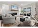 Living room features a modern fireplace and access to a patio at 403 Cool Bend Ln, Summerville, SC 29486