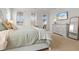 Beautifully designed main bedroom showcasing a bed, dresser with television, and a mirror at 403 Cool Bend Ln, Summerville, SC 29486
