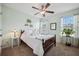 This bedroom is bright and spacious with a queen bed and warm natural light at 422 Verbena Ave, Summerville, SC 29483