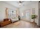 Cozy sun room with lots of natural light, wood-look tile floors, and access to the outdoors at 422 Verbena Ave, Summerville, SC 29483