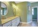 The bathroom has double sinks, granite countertops, tiled floors, and a separate area at 4303 Misty Hollow Ln, Ravenel, SC 29470