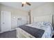 Comfortable bedroom with hardwood floors, tasteful decor, and ceiling fan at 4303 Misty Hollow Ln, Ravenel, SC 29470