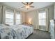 Cozy bedroom with natural light, a ceiling fan, and tasteful decor at 4303 Misty Hollow Ln, Ravenel, SC 29470