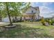 Charming two-story house with a spacious front yard and inviting curb appeal at 4303 Misty Hollow Ln, Ravenel, SC 29470