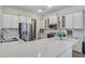 Bright kitchen with stainless appliances and a large island perfect for cooking and entertaining at 4303 Misty Hollow Ln, Ravenel, SC 29470