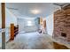 Large basement space featuring a brick fireplace at 4327 Bream Rd, North Charleston, SC 29418