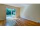 Sunlit dining area with hardwood floors and access to outdoor backyard at 4327 Bream Rd, North Charleston, SC 29418