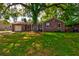 Charming brick home with a well-maintained lawn and mature trees offering plenty of shade at 4327 Bream Rd, North Charleston, SC 29418