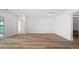 Bright and airy living room with hardwood floors, white walls, and abundant natural light at 434 Evening Glow Ln, Summerville, SC 29486