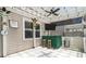 Backyard patio area under a pergola with a TV and outdoor kitchen for entertaining at 4916 Paddy Field Way, Ladson, SC 29456