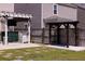 Serene backyard featuring a covered patio area with a grill, perfect for entertaining at 4916 Paddy Field Way, Ladson, SC 29456