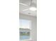 Bedroom window with blinds offering views of a lake and surrounding neighborhood at 4916 Paddy Field Way, Ladson, SC 29456