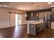 Modern kitchen featuring a stylish island, stainless steel appliances, and sleek gray cabinetry at 4916 Paddy Field Way, Ladson, SC 29456