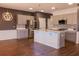 Modern kitchen featuring an island, stainless steel appliances, and trendy lighting fixtures at 4916 Paddy Field Way, Ladson, SC 29456