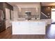 Kitchen featuring a white island, stainless steel appliances, and gray cabinetry in an open space at 4916 Paddy Field Way, Ladson, SC 29456