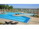 Community pool with lounge chairs, water features, and plenty of space for fun at 538 Verdi Dr, Summerville, SC 29486