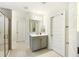 Bathroom showcasing a shower, vanity with mirror, and white walls at 555 Dunswell Dr, Summerville, SC 29486