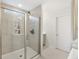Modern bathroom featuring a glass enclosed shower with tile surround and tile flooring at 555 Dunswell Dr, Summerville, SC 29486