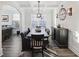 Dining room showcasing a modern light fixture, bench seating and stylish decor at 555 Dunswell Dr, Summerville, SC 29486