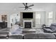 Large living room featuring hardwood flooring, modern furniture, and a fireplace at 555 Dunswell Dr, Summerville, SC 29486