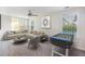 Bright living room featuring a comfortable sofa and a foosball table at 555 Dunswell Dr, Summerville, SC 29486