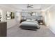 This is a stunning bedroom featuring a trey ceiling, two windows, and neutral wall colors at 555 Dunswell Dr, Summerville, SC 29486