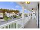 View from the porch showing the neighborhood and houses across the street at 555 Dunswell Dr, Summerville, SC 29486