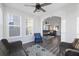 Sunroom with modern furnishings, ceiling fan, hardwood flooring, and lots of natural light at 555 Dunswell Dr, Summerville, SC 29486