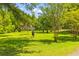 Tree covered lot with large backyard at 6035 Bay Pond Rd, Ravenel, SC 29470