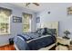 Comfortable bedroom featuring hardwood floors, natural light and neutral wall color at 6035 Bay Pond Rd, Ravenel, SC 29470