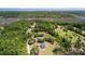 Aerial view of a home surrounded by trees, close to marshy waterfront with gorgeous views at 795 Shagule Rd, Edisto Island, SC 29438