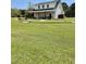 Beautiful backyard features an expansive lawn at 795 Shagule Rd, Edisto Island, SC 29438