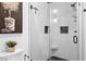 Contemporary bathroom showcasing a glass enclosed shower with white subway tiles and black hardware at 795 Shagule Rd, Edisto Island, SC 29438