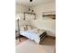 Cozy bedroom includes a bunk bed with a ladder and a landscape painting at 795 Shagule Rd, Edisto Island, SC 29438