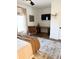 Bedroom with a wooden desk and chair, TV and leather chair at 795 Shagule Rd, Edisto Island, SC 29438