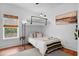 Charming bedroom with a built-in bunk bed, natural light, and cozy decor at 795 Shagule Rd, Edisto Island, SC 29438