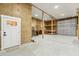 Spacious garage with unfinished walls, ample storage, and a convenient side entry door at 795 Shagule Rd, Edisto Island, SC 29438