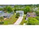 Aerial view of a home in a well-developed community with mature trees at 828 Williamsburg Ln, Charleston, SC 29414