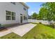 Backyard with a patio and view of the home's exterior at 828 Williamsburg Ln, Charleston, SC 29414