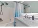 Stylish bathroom featuring a marble countertop vanity and shower with curtain at 828 Williamsburg Ln, Charleston, SC 29414