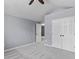 This bedroom has vaulted ceiling, plush carpet and a view into the hallway at 828 Williamsburg Ln, Charleston, SC 29414