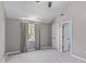 Bright bedroom featuring plush carpeting and a window view to the exterior at 828 Williamsburg Ln, Charleston, SC 29414