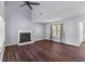 Spacious living room with hardwood floors, fireplace, and ample natural light at 828 Williamsburg Ln, Charleston, SC 29414
