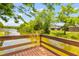 Scenic view of a waterway from a wood deck, surrounded by trees at 828 Williamsburg Ln, Charleston, SC 29414