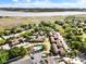 Aerial view of the condominium complex surrounded by lush greenery and scenic waterways at 870 Colony Dr # 14, Charleston, SC 29407