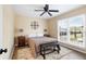 Inviting bedroom featuring a ceiling fan, hardwood floors, and a neutral color scheme at 870 Colony Dr # 14, Charleston, SC 29407