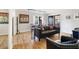 A living room with wood floors, dark furniture, and a window view at 870 Colony Dr # 14, Charleston, SC 29407