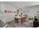 Cozy dining area with a wooden table, seating for four, and stylish decor touches throughout at 928 Sycamore Ave, Charleston, SC 29407