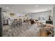 Spacious open-concept living area with modern finishes, wood flooring and a seamless flow at 928 Sycamore Ave, Charleston, SC 29407