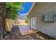 Expansive backyard deck leads to the house through double french doors, enhancing indoor-outdoor living at 9630 N Cardinal Dr, Ladson, SC 29456